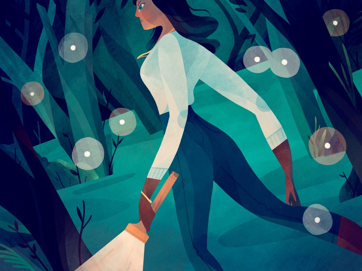 A woman walking in the woods with a flashlight at night. She is surrounded by fireflies.